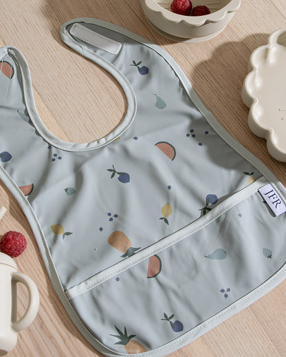 Pyyhittävä/Vedenpitävä Ruokalappu - HedelmäSalaatti Sininen